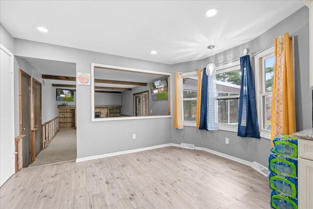 3715 W Hiawatha Dr, Okemos, MI 48864 - unfurnished room featuring wood finished floors, baseboards, visible vents, and recessed lighting