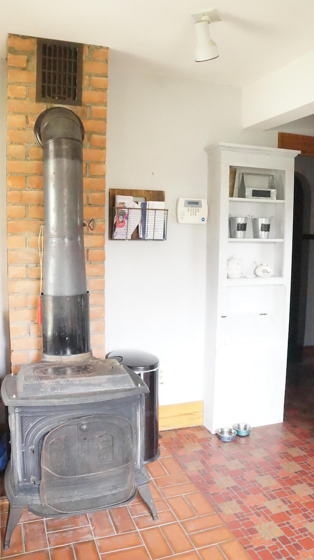 11340 Mccrone Rd, Milan, MI 48160 - detailed view of a wood stove