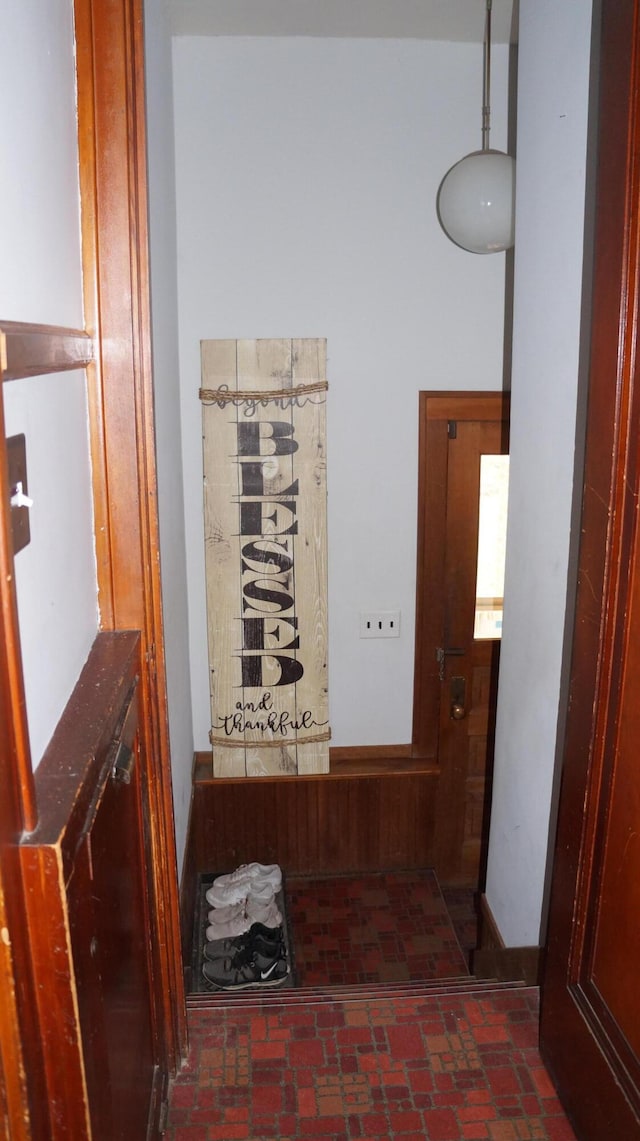 11340 Mccrone Rd, Milan, MI 48160 - hallway with brick flooring