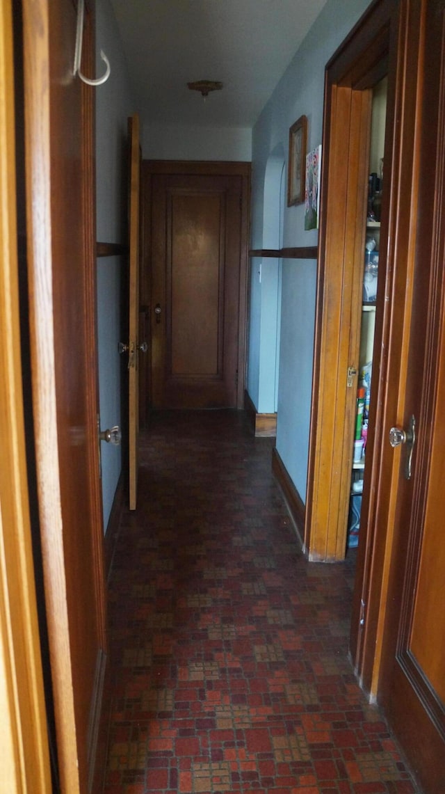 11340 Mccrone Rd, Milan, MI 48160 - hallway with brick floors and baseboards