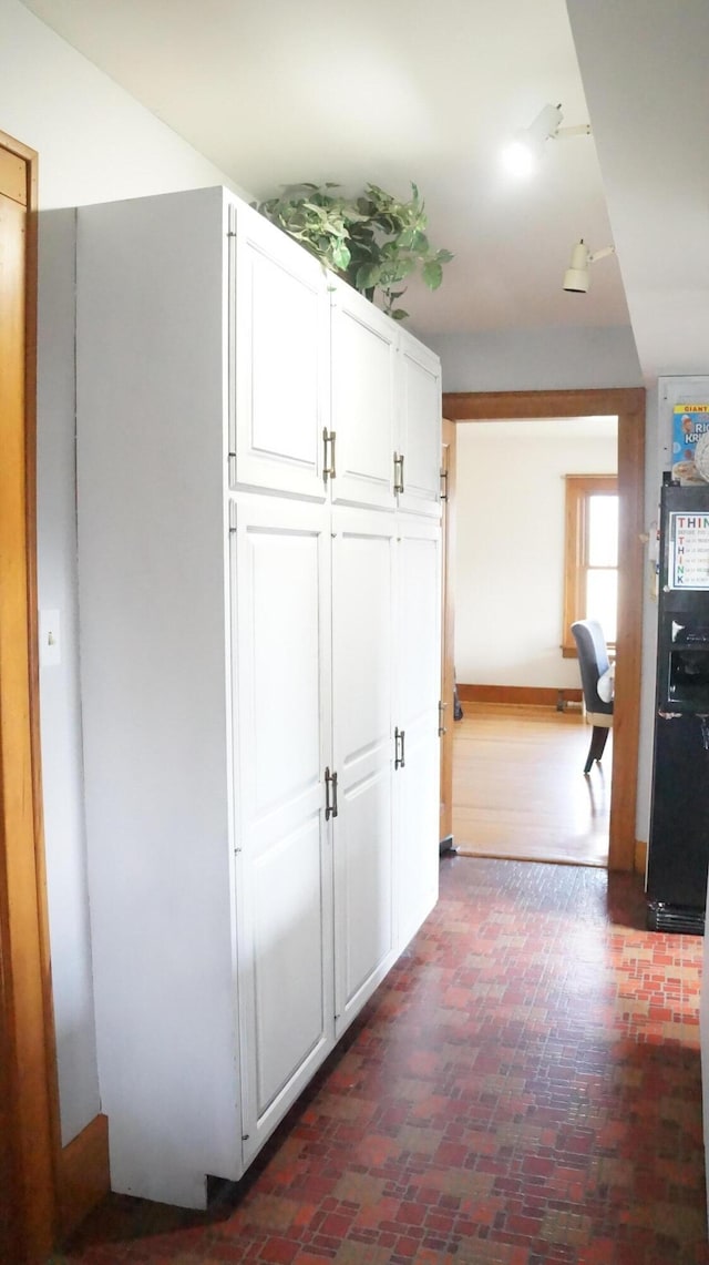 11340 Mccrone Rd, Milan, MI 48160 - corridor with brick patterned floors