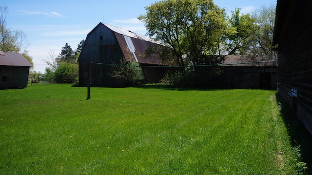 11340 Mccrone Rd, Milan, MI 48160 - view of green lawn with a barn and an outdoor structure