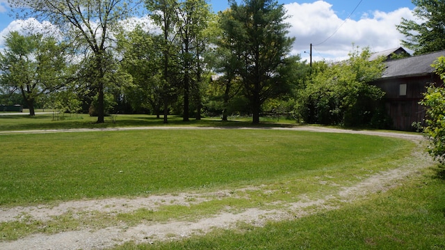 11340 Mccrone Rd, Milan, MI 48160 - view of green lawn with curved driveway