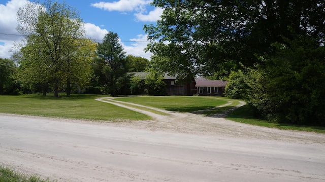 11340 Mccrone Rd, Milan, MI 48160 - view of front of house featuring driveway and a front yard