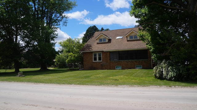 11340 Mccrone Rd, Milan, MI 48160 - view of side of home with a lawn and brick siding