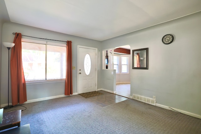 3638 Katherine St, Dearborn, MI 48124 - entryway featuring baseboards, carpet, and visible vents