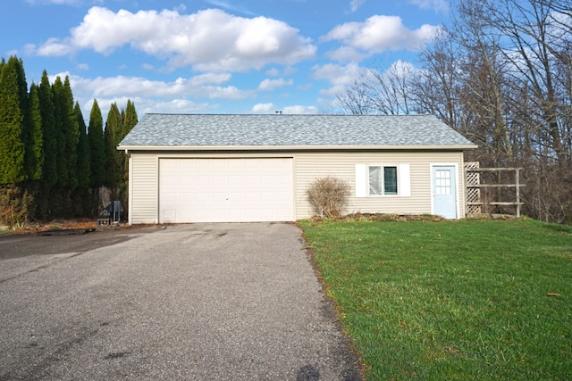2515 N Lake Pleasant Rd, Attica, MI 48412 - garage with asphalt driveway