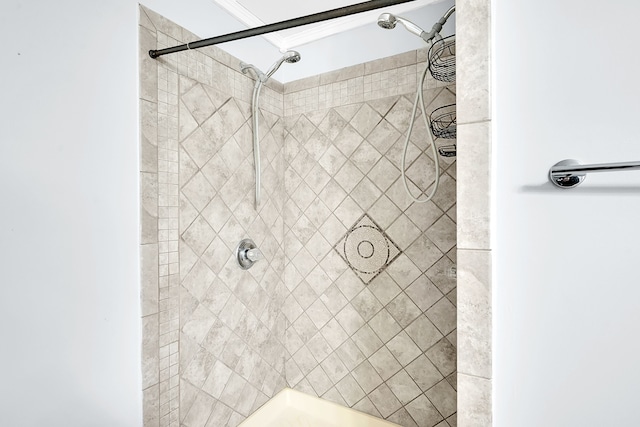 2515 N Lake Pleasant Rd, Attica, MI 48412 - bathroom featuring a tile shower and crown molding