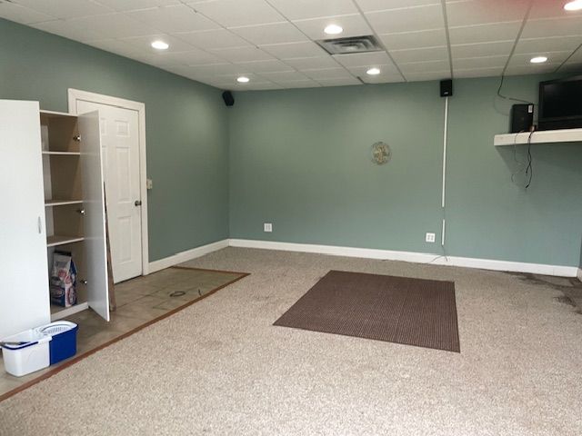2515 N Lake Pleasant Rd, Attica, MI 48412 - below grade area featuring carpet floors, recessed lighting, baseboards, and a paneled ceiling