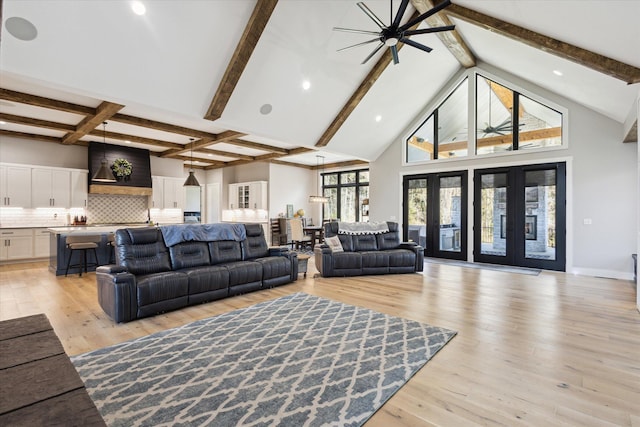 living room with recessed lighting, ceiling fan, beam ceiling, and light wood-style floors