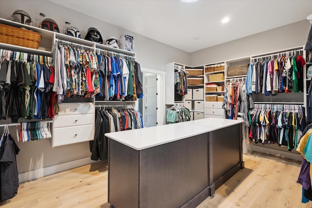spacious closet featuring light wood finished floors