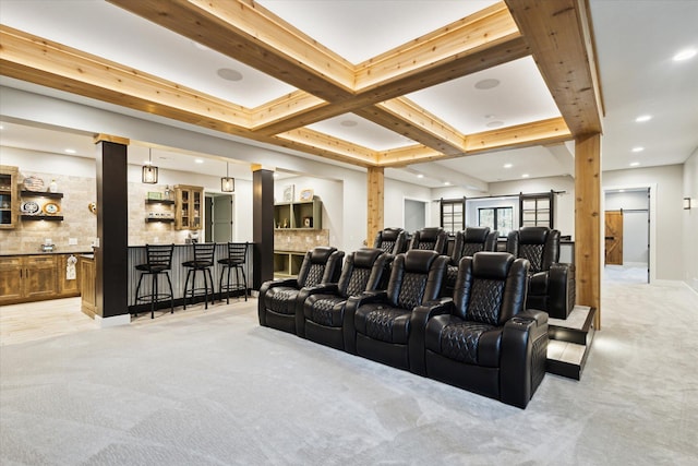 cinema with recessed lighting, bar area, and light colored carpet
