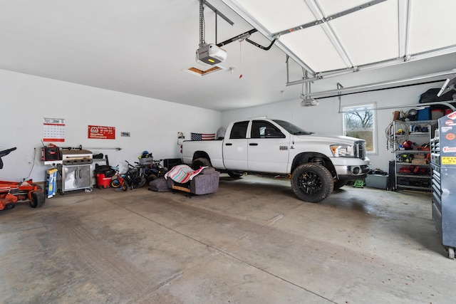 garage featuring a garage door opener