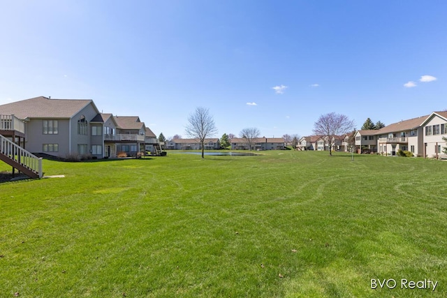 view of yard with a residential view
