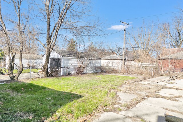 19544 Strasburg St, Detroit, MI 48205 - view of yard with a shed, an outdoor structure, and fence