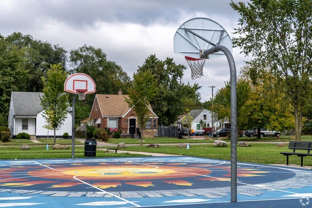 19544 Strasburg St, Detroit, MI 48205 - view of basketball court featuring community basketball court and a lawn