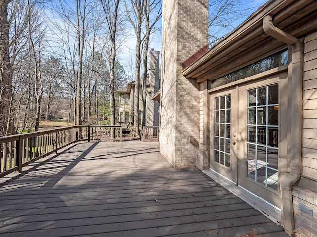 wooden terrace featuring french doors