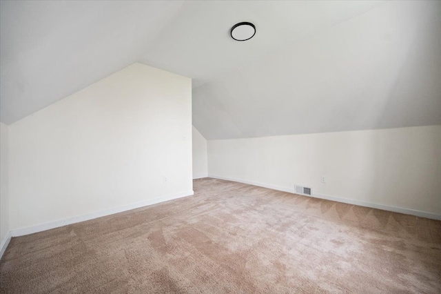 11393 Fisher Ave, Warren, MI 48089 - bonus room with baseboards, vaulted ceiling, visible vents, and carpet