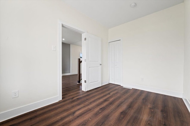 11393 Fisher Ave, Warren, MI 48089 - empty room with baseboards and dark wood-style flooring