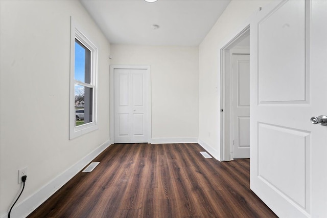 11393 Fisher Ave, Warren, MI 48089 - interior space with visible vents, baseboards, a closet, and dark wood finished floors