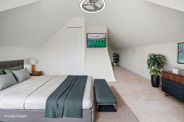 11393 Fisher Ave, Warren, MI 48089 - bedroom featuring lofted ceiling, baseboards, carpet flooring, and a closet