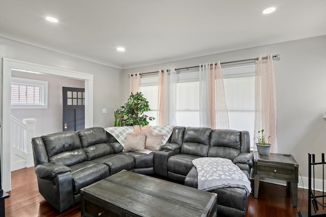 living area with recessed lighting and dark wood-style flooring