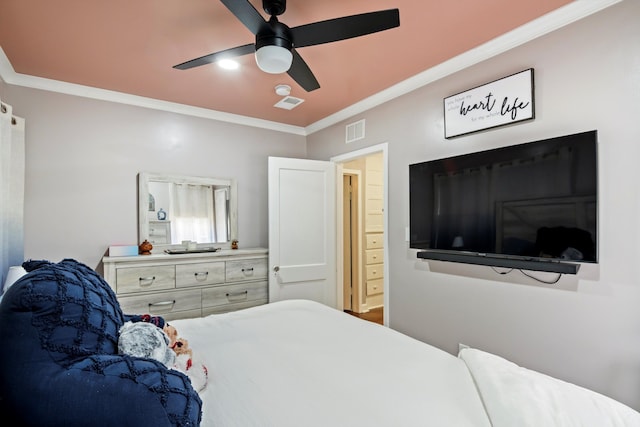 bedroom featuring crown molding, visible vents, and ceiling fan