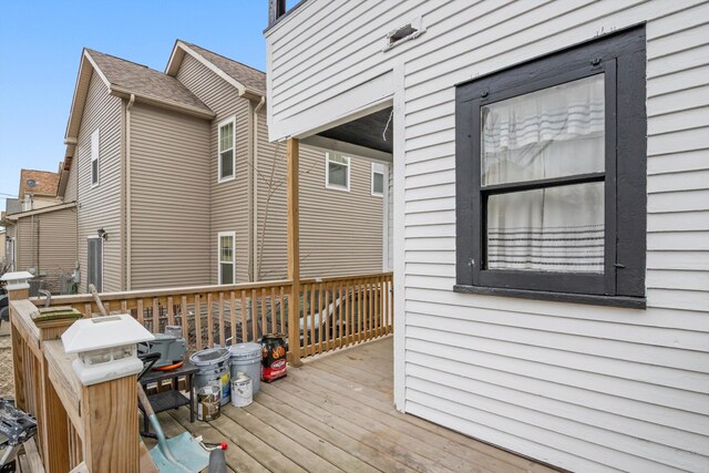 wooden deck featuring area for grilling