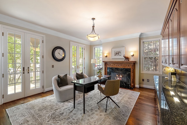 home office featuring french doors, baseboards, a premium fireplace, and dark wood finished floors
