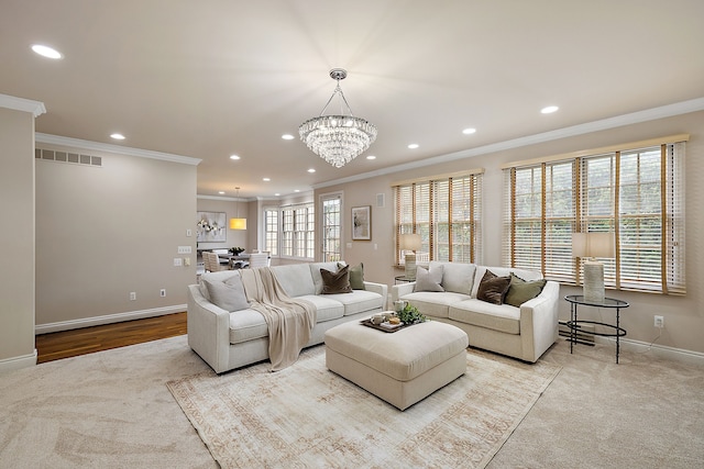 carpeted living area featuring ornamental molding, baseboards, recessed lighting, and visible vents