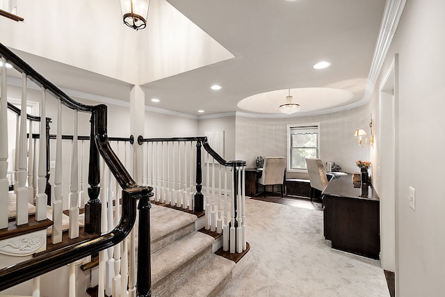 staircase with ornamental molding, recessed lighting, and carpet floors