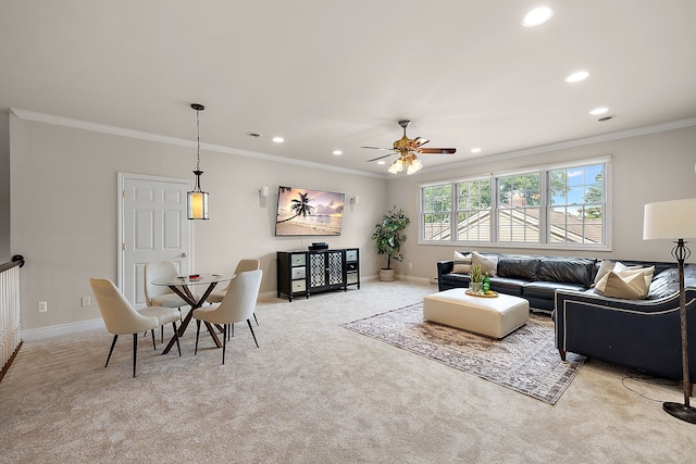 living area featuring carpet flooring, ornamental molding, and recessed lighting