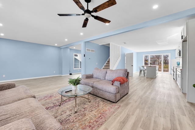 2533 Virginia Park St, Detroit, MI 48206 - living room with ceiling fan, visible vents, recessed lighting, stairway, and light wood finished floors