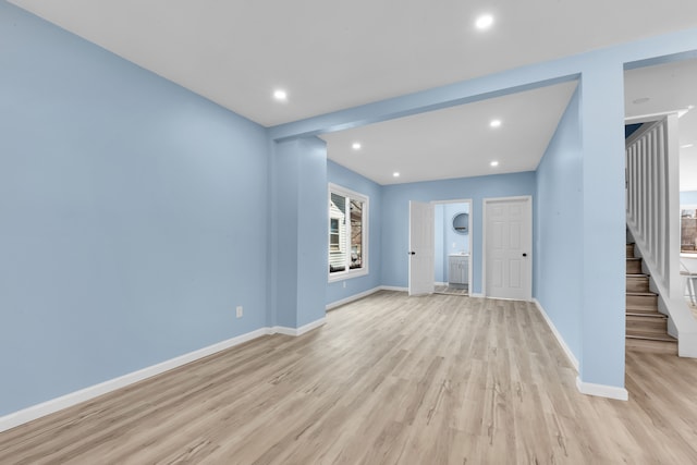 2533 Virginia Park St, Detroit, MI 48206 - unfurnished living room with light wood-style flooring, recessed lighting, baseboards, and stairway