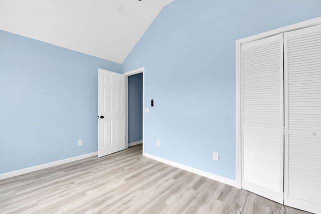 2533 Virginia Park St, Detroit, MI 48206 - unfurnished bedroom with high vaulted ceiling, light wood-type flooring, a closet, and baseboards