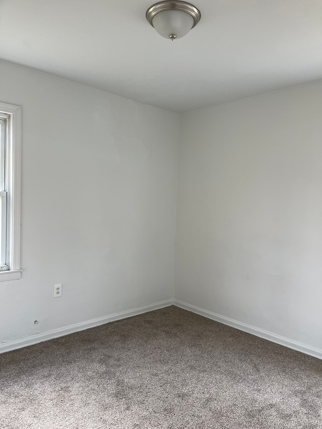 305 S Blvd W, Pontiac, MI 48341 - carpeted empty room with baseboards