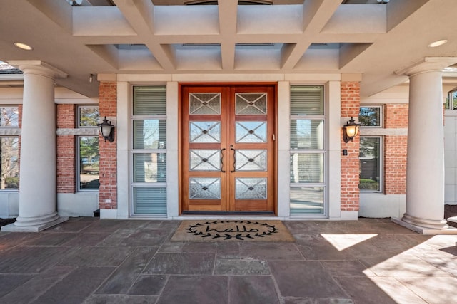 82 Chateaux Du Lac, Fenton, MI 48430 - doorway to property with brick siding