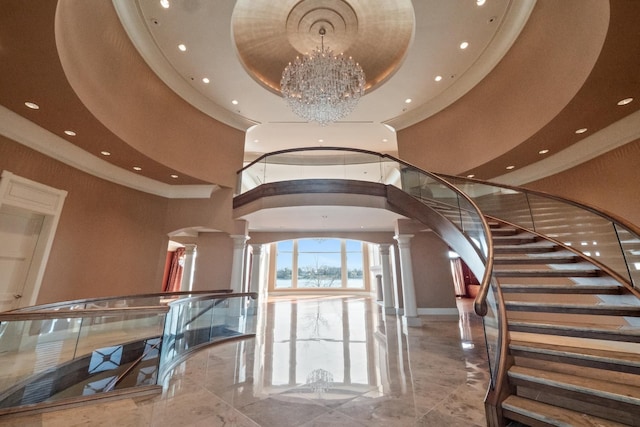 82 Chateaux Du Lac, Fenton, MI 48430 - lobby with stairway and a water view
