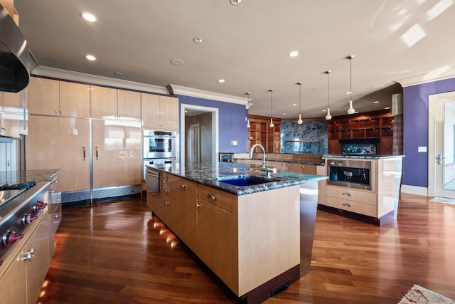 82 Chateaux Du Lac, Fenton, MI 48430 - kitchen featuring crown molding, dark wood-style floors, a spacious island, dark stone counters, and a sink