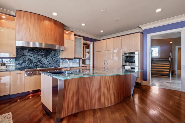 82 Chateaux Du Lac, Fenton, MI 48430 - kitchen with a sink, appliances with stainless steel finishes, crown molding, and dark stone countertops