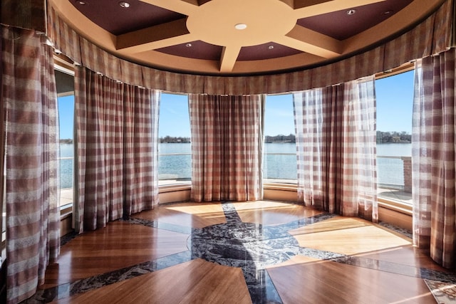 82 Chateaux Du Lac, Fenton, MI 48430 - sitting room featuring ceiling fan, recessed lighting, wood finished floors, a water view, and coffered ceiling