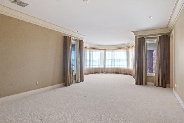 82 Chateaux Du Lac, Fenton, MI 48430 - carpeted spare room featuring crown molding, baseboards, and visible vents