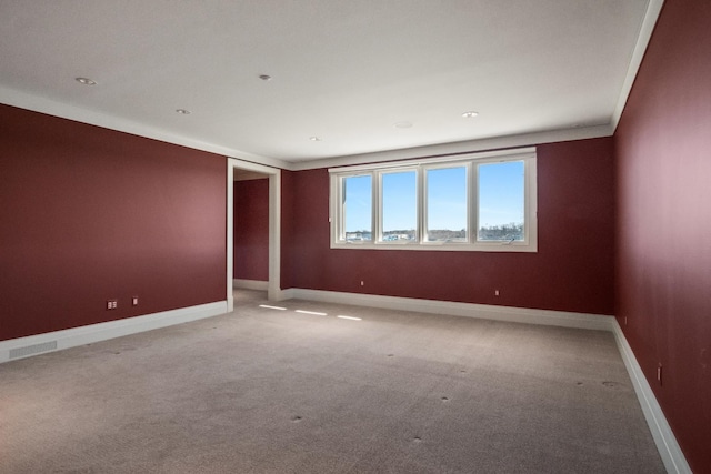 82 Chateaux Du Lac, Fenton, MI 48430 - spare room featuring light colored carpet, recessed lighting, baseboards, and visible vents