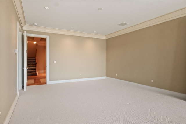 82 Chateaux Du Lac, Fenton, MI 48430 - unfurnished room featuring baseboards, light colored carpet, ornamental molding, and visible vents
