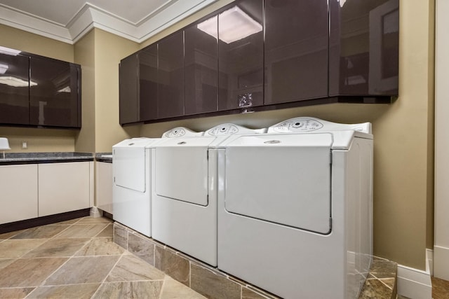 82 Chateaux Du Lac, Fenton, MI 48430 - washroom featuring washer and dryer, stone finish floor, and cabinet space