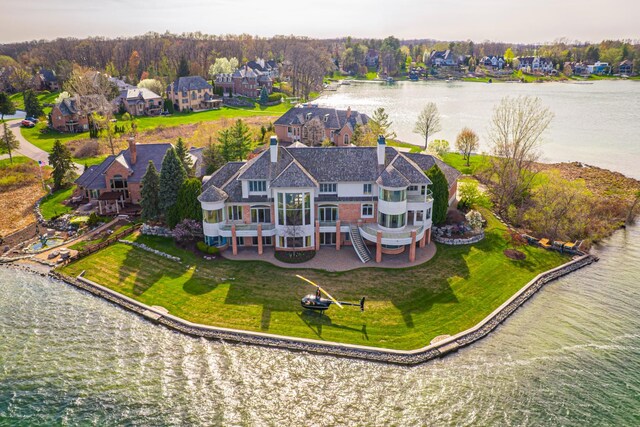 82 Chateaux Du Lac, Fenton, MI 48430 - bird's eye view featuring a water view
