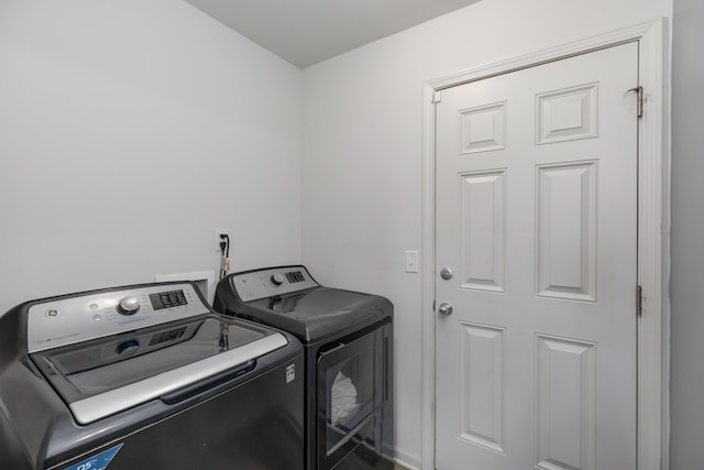 laundry area with laundry area and washing machine and dryer