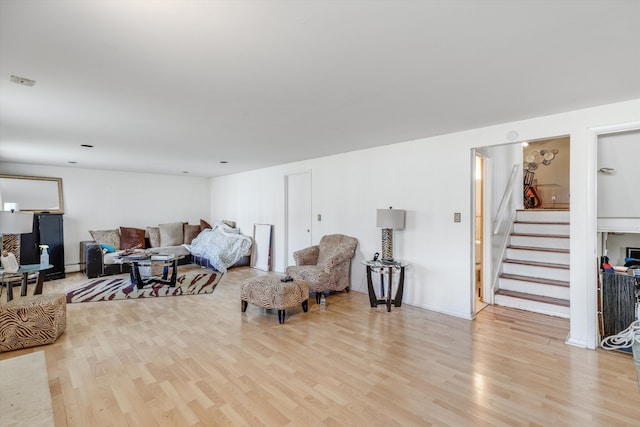 29190 Heritage, Southfield, MI 48076 - living area with light wood-style flooring and stairway
