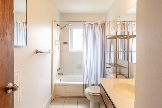 bathroom featuring tile patterned floors, toilet, shower / bathtub combination with curtain, and vanity