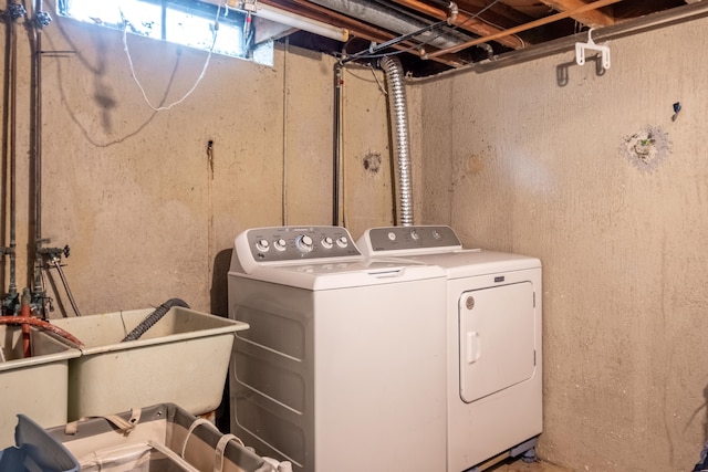 washroom with washer and clothes dryer